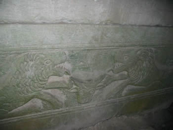 Lions devouring a cow on sarcophagus 